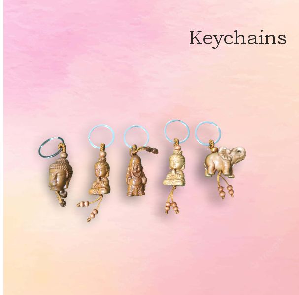 Keychain buddha & elephant — handmade Kondapalli Bommalu